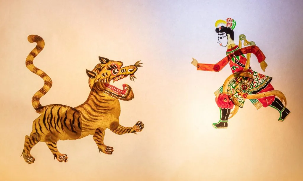 Nezha tigre ombres en cuir découpé